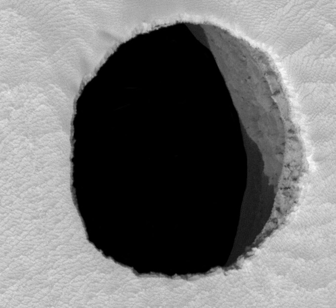 Cave opening in the Arsia Mons volcano on Mars